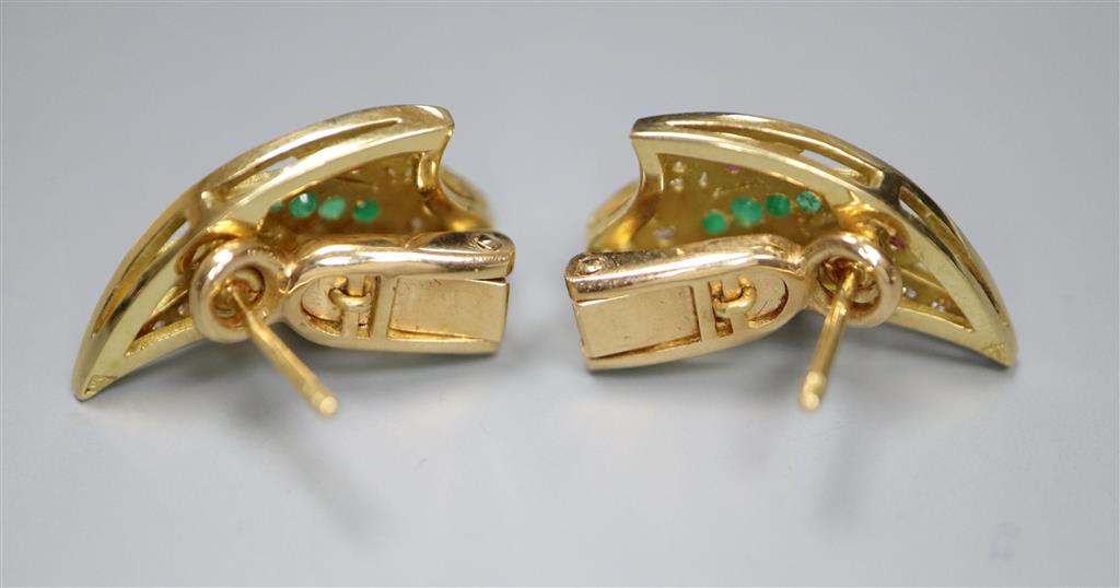 A modern pair of Middle Eastern yellow metal, ruby, emerald and diamond cluster set earrings, 300